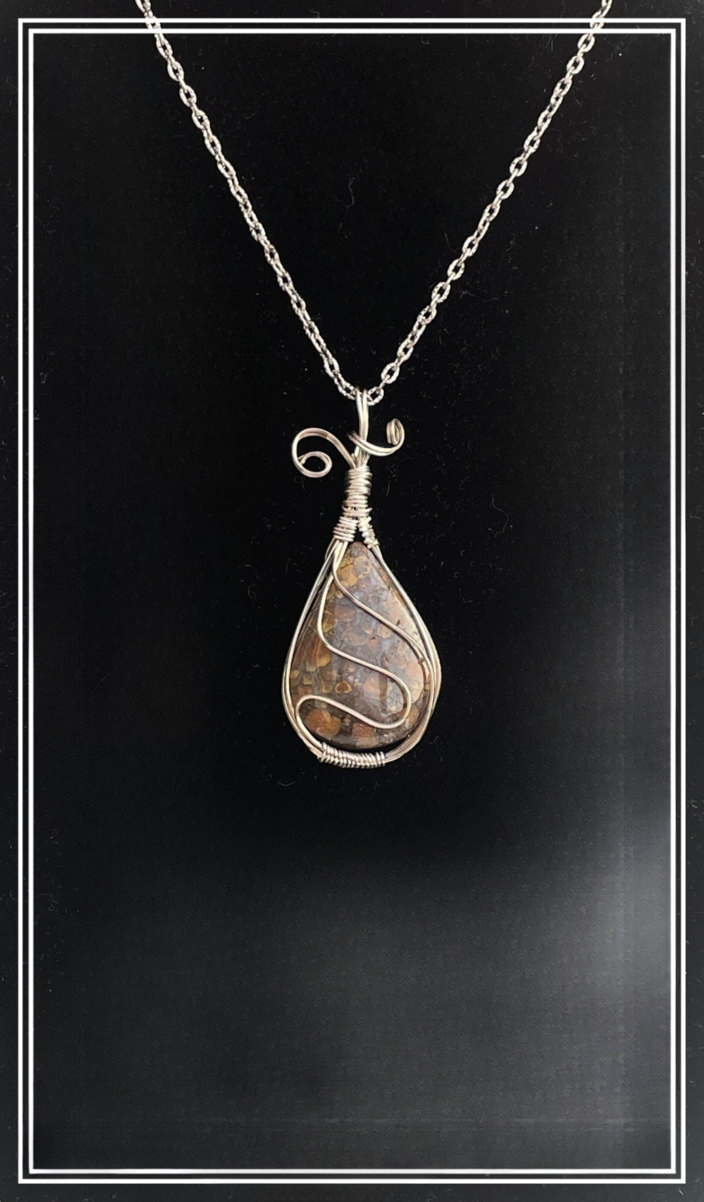 BJ0001 Pear-shaped 35mm x 25mm Biggs Jasper Pendant Wrapped in Silver Wire Frame on Silver Chain