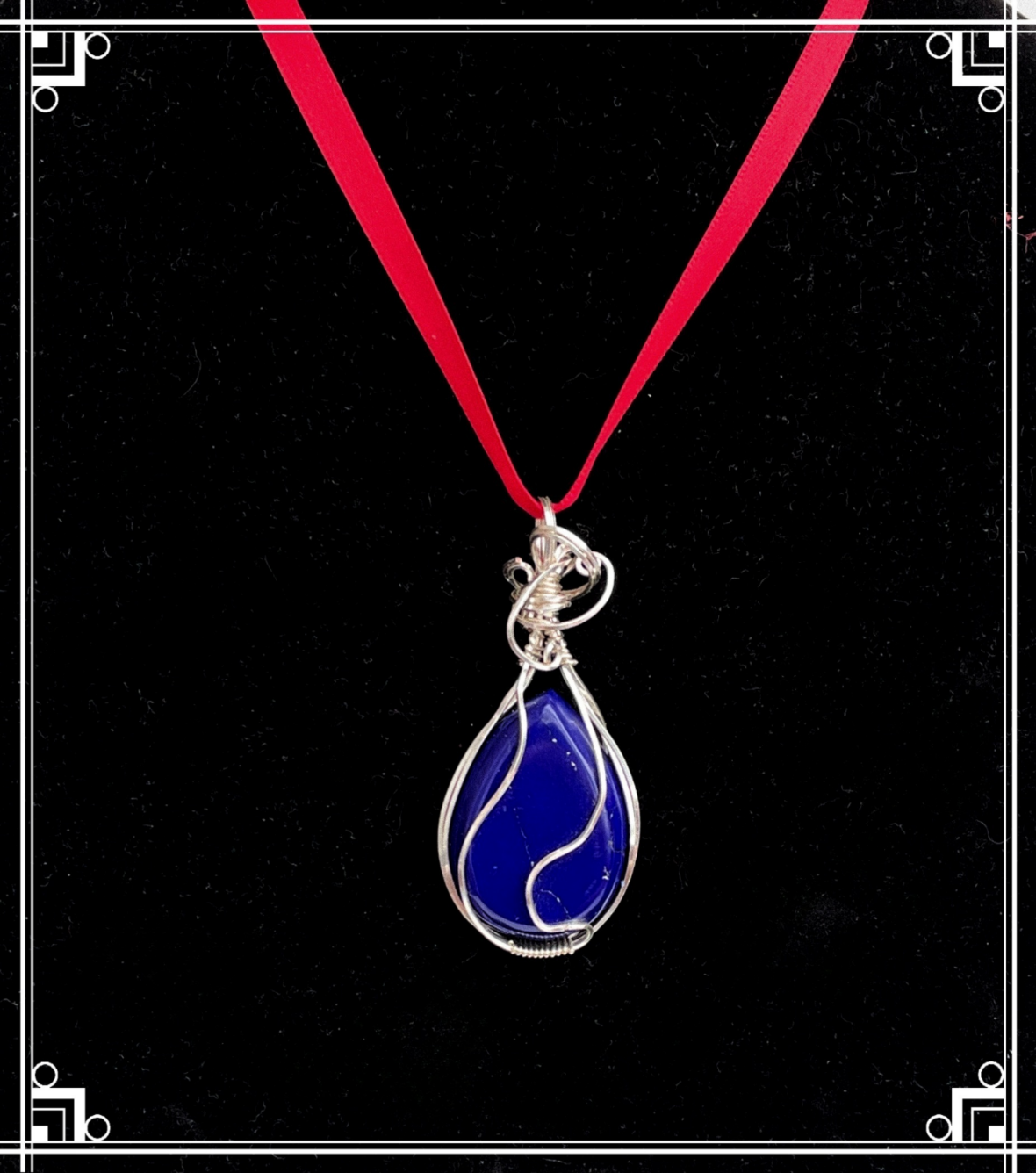 LL0002 Pear-shaped 40mm x 25mm Lapis Lazuli Wrapped In Argentium Silver